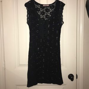 Black see through lace dress.